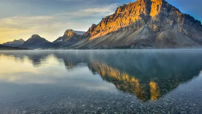 Stunning sunrise view of Bow Lake and mountains in Banff National Park, Alberta, Canada.