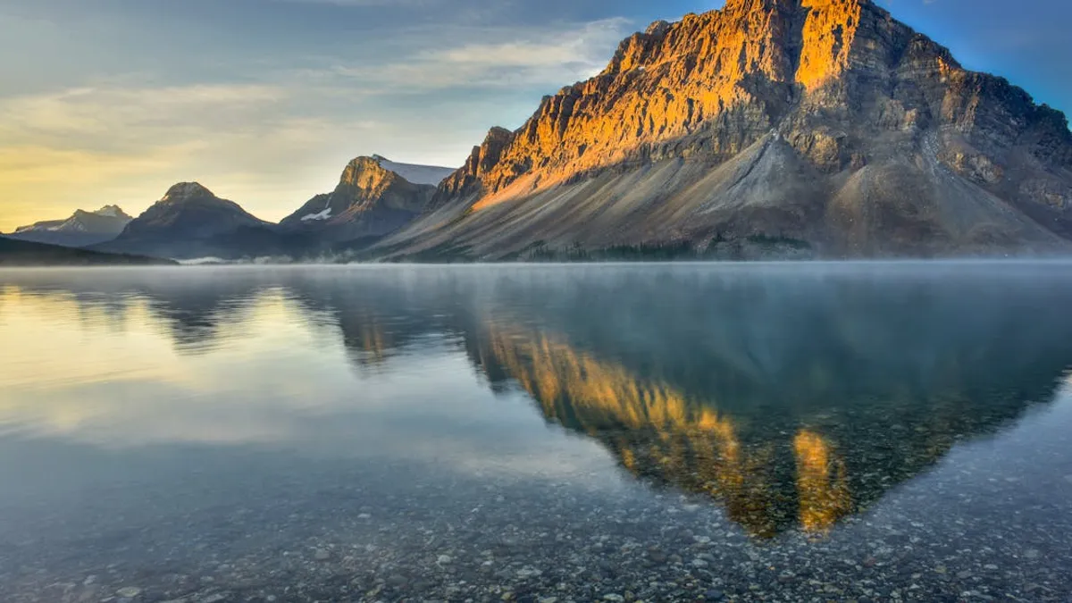 Stunning sunrise view of Bow Lake and mountains in Banff National Park, Alberta, Canada.